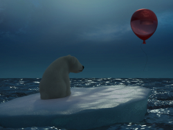 Orso polare con un palloncino rosso
