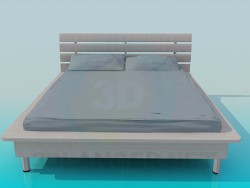 Bett mit einer Rundung im Umkreis des Bettes