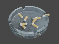 Cenicero con colillas de cigarrillos