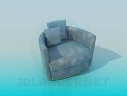 A chair with pillows