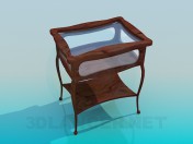 Tavolino in legno con vetro piano