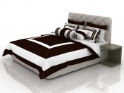 Ліжко з біло-шоколадним постільною білизною