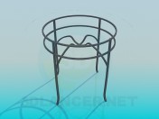 Круглий скляний столик на металевій основі