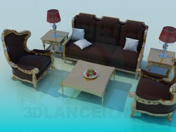 Um conjunto de mobiliário na sala de estar