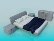 Un lit, commodes et armoires en kit
