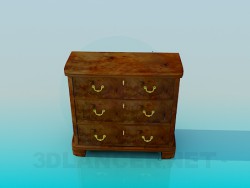 A small chest with drawers with key