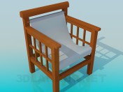 Cadeira de madeira com um assento de têxteis