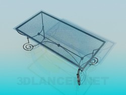 Coffee table on wrought iron legs