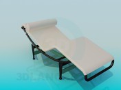 Sunbed with headrest