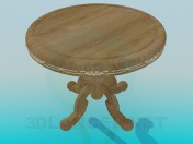 Круглий дерев'яний столик