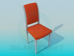 Stuhl mit geschnitzten Beinen