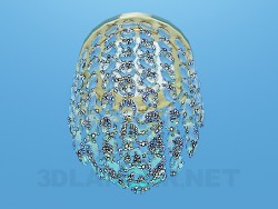 Uma pequena lâmpada decorada com contas de vidro transparente