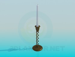 A candle in a candleholder
