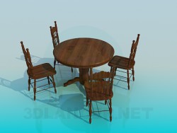 Mesas de madeira e cadeiras no conjunto