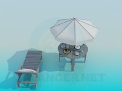 Tumbona, mesa de playa con sombrilla