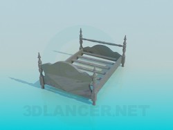 Wooden bed in the old style